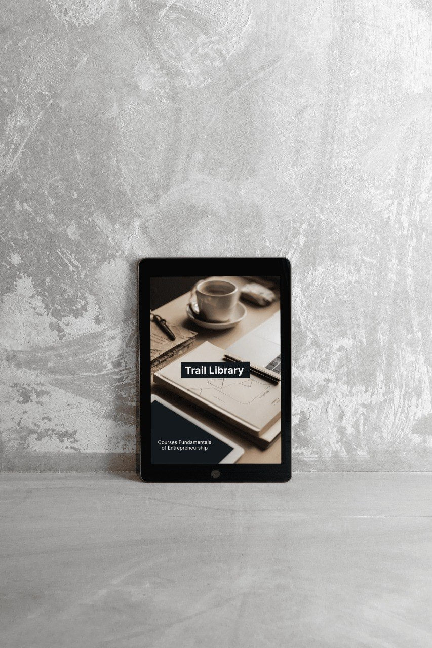 Digital tablet displaying a book cover with a cup of coffee on a textured gray surface